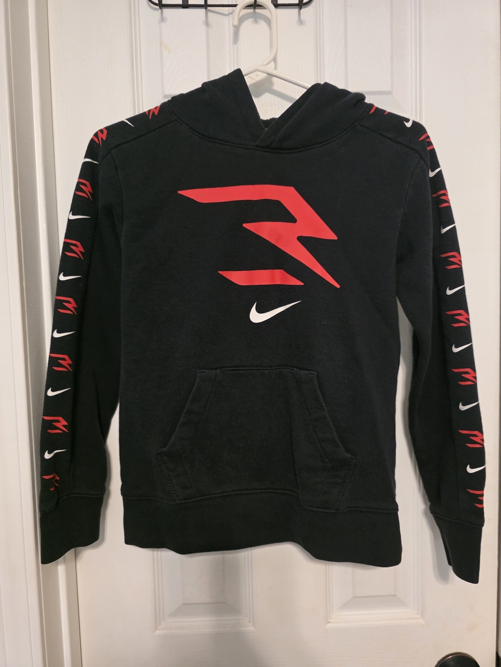 Nike Black Hoodie with Red Graphic and White Swoosh